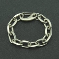 Bracelet gourmette argenté style punk avec détail tête de mort et grand fermoir - Argent Style Cinq (Chaîne à Maillons Ovales Épais)
