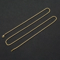 Detalle de una cadena de caja de acero inoxidable dorado pulido con un cierre de langosta - caja cadena / 0.2*75cm / Dorado