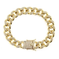 Vista detallada de pulsera de cadena cubana dorada con circonitas cúbicas pavé - Dorado