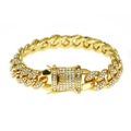 Iced out gold Cuban link bracelet for men featuring white zircons and a secure box clasp - Gold