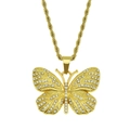 Detailed macro of gold butterfly pendant with sparkling cubic zirconia on a rope chain - Rope Chain Butterfly Style / Gold