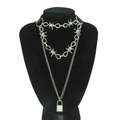 Layered silver necklace set featuring barbed wire choker and minimalist padlock pendant - Silver
