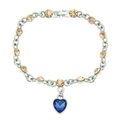 Detalle de pulsera plateada con cristales champán y colgante de corazón azul oscuro - Plata (Corazón Azul)