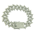 Macro detail of silver-toned iced out hip hop bracelet with flame claw links and crystals - Silver