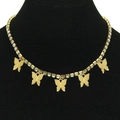 Detail of gold choker necklace featuring five crystal-studded butterfly charms on display - Gold Chain White Rhinestone