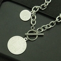 Detail of silver OT buckle chain with engraved coin pendant and Love charm - One Penny Coin Double Round (Style 6)