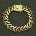 Macro detail of 15mm hip hop cuban link bracelet with gold finish and iced out crystals - Gold (Black Rhinestone)