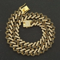 Nahaufnahme der dicken goldenen Panzerkette mit schwarz-weißen Steinen und Sicherheitsverschluss - 18inch / Gold (Schwarzer Strass)