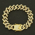 Macro shot of gold-plated Hip-hop Cuban chain with iced-out crystals and a box clasp - Gold (White Rhinestone)