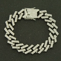 Close-up of 15mm iced-out Cuban link bracelet with sparkling rhinestones on black background - Silver (White Rhinestone)