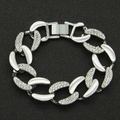 Close-up of silver-tone chunky Cuban link bracelet with sparkling rhinestones and clasp - Silver Bracelet / Silver