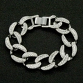 Macro shot of silver-colored iced out Cuban link bracelet with sparkling rhinestones - Silver Bracelet