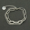 Zweilagiges silbernes kubanisches Kettenarmband mit Zirkonia-Ovalgliedern und rundem Anhänger - Silber