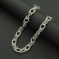 Detail of silver interlocking chain links with frosted texture on dark background - 45cm / Silver