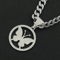 Close-up of iced out butterfly pendant on a silver Cuban link chain with crystals - Silver Tone With White Rhinestone Butterfly With 50cm Cuban Link Chain