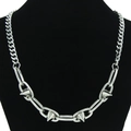 Titanium steel punk cuban link necklace with metallic studs on black velvet display - Rivet Cuban Link / Silver