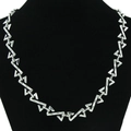 Unisex silver letter Z necklace with geometric textured pattern on a black neck bust - Necklace