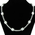 Detail of silver Cuban chain necklace with colorful rectangular crystals on black bust - 20 Inch / Silver Necklace
