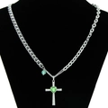 Silver cross necklace with green heart gemstone and curb chain on display - Green Heart Rhinestone Cross Necklace