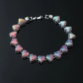 Exaggerated heart-shaped bracelet featuring iridescent mermaid scales and diamond accents - Silver