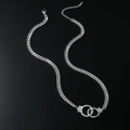 Hip hop silver handcuff pendant necklace with shimmering zircon stones on black background - Silver Handcuff-Curb Chain 45+6cm