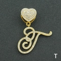 Close-up of golden iced-out heart clasp and letter T pendant with sparkling cubic zirconia - Letter T / Gold