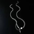 Titanium steel cross necklace with cat eye stone and asymmetrical chain design - Silver