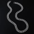 Collana a catena cubana argento con pavé di diamanti in forma a S su sfondo nero lucido - Collana (50cm) / Argento