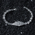 Zilveren St. Judas armband met bladschakels en kruisbedeltjes op zwarte stenen - Zilver