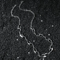 Abstract irregular liquid metal flame necklace on black stones with y2k street style - Silver Irregular Style
