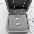 Elegant S925 sterling silver blue evil eye necklace on gray velvet jewelry display - Full 925 Sterling Silver / White Gold