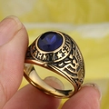 Vintage gold military ring for men featuring a blue sapphire gem and eagle relief - Gold Plated Blue Zirconia