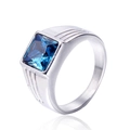 Macro view of men's titanium ring with square blue gemstone and side groove details - Silver/Blue Zirconia