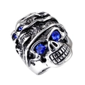 Gothic skull ring with blue crystal eyes in vintage silver finish on white background - US 7 / Silver