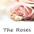 Elegant gold S925 silver ring with five white pearls set against pink rose petals - Adjustable Open / Gold
