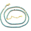 Détail du collier tennis en argent S925 plaqué or avec zircons cubiques bleus - Argent 925 / Zirconia Bleu Ciel Plaqué Or