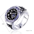 Macro detail of vintage Masonic skull ring with blue enamel and relief engraving - US 7 / Steel
