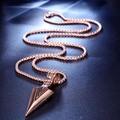 Detail of rose gold arrowhead pendant with geometric texture and industrial chain - Rose Gold Arrowhead Pendant Necklace