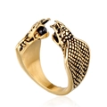Macro detail of golden cobra ring featuring dual snake heads and black bead accents - US 7 / Gold Black Zirconia
