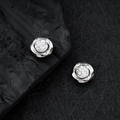 Silver flower-shaped magnetic ear studs with cluster of cubic zirconia in spiral design - Mobius Ear Clip / Brilliant White