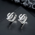 Silver trident earrings with sparkling zircon inlay over luxury black leather texture - Silver (White Rhinestone)