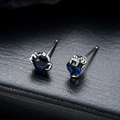 Claw-shaped silver studs with blue zircon gemstones on black leather background - Blue(X936-C)