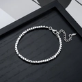 Minimalistische zilveren roestvrijstalen armband met geometrische schakels en sluiting - Zilver Hematiet Armband