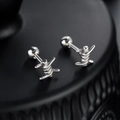 Detailed close-up of silver knot stud earrings with a secure screw ball back closure - Silver Knot Style (X953-A)