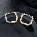 Two-tone silver and gold Mobius earrings with hammer textured finish on black base - Gold and Silver (X947-C)