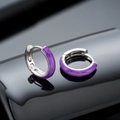 Detailed view of silver hoop earrings with purple enamel inlay on a black reflective surface - Drip Oil Earrings (X986-D) / Purple