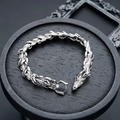Close-up of retro dragon head bracelet with detailed scales and punk metal texture - Silver 20cm (S310-A)