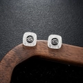 Macro shot of silver square stud earrings with black circular inlay and retro engraving - Black Pattern Style (X962-B)