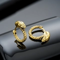 Vintage golden snake head hoop earrings with detailed scale texture on black background - Gold Style / Gold