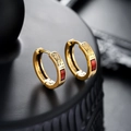 Detail of vintage gold earrings with red enamel inlay and intricate ethnic engravings - Gold Red (X983-F)